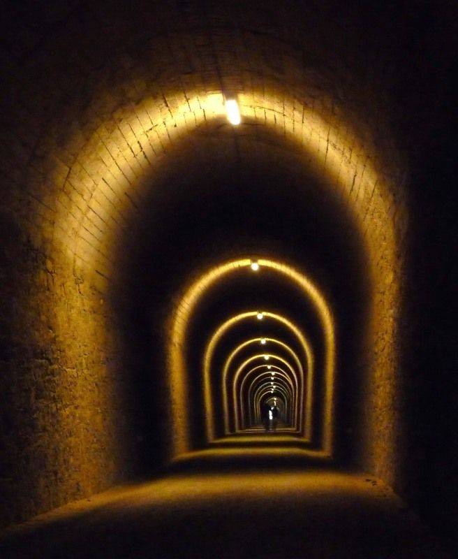 Bicycling through a tunnel in Andalusia, Spain